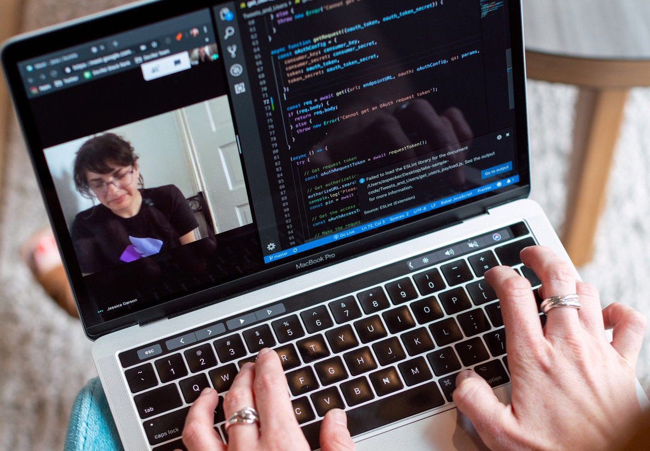 Worker using laptop videoconferencing
